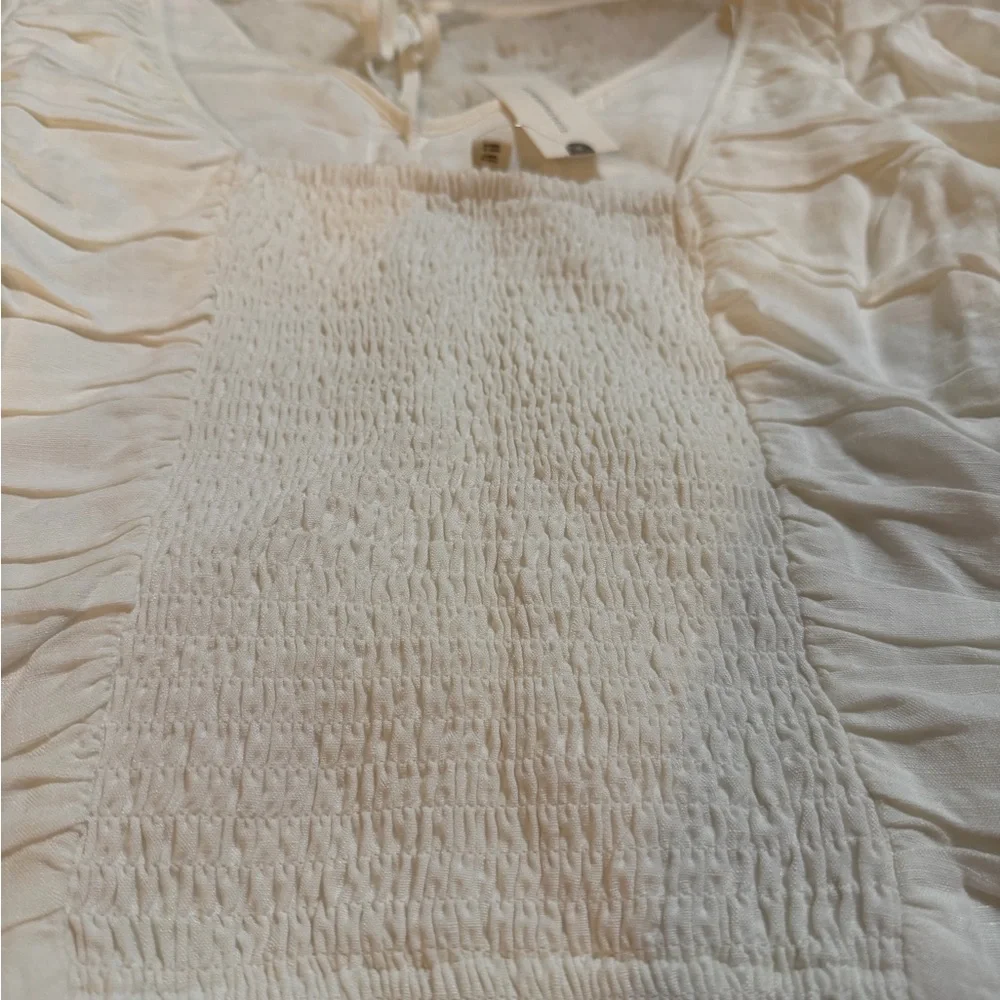 Anthropologie chic cream
